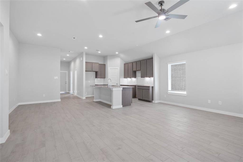 Another view taken from Family Room into the kitchen.