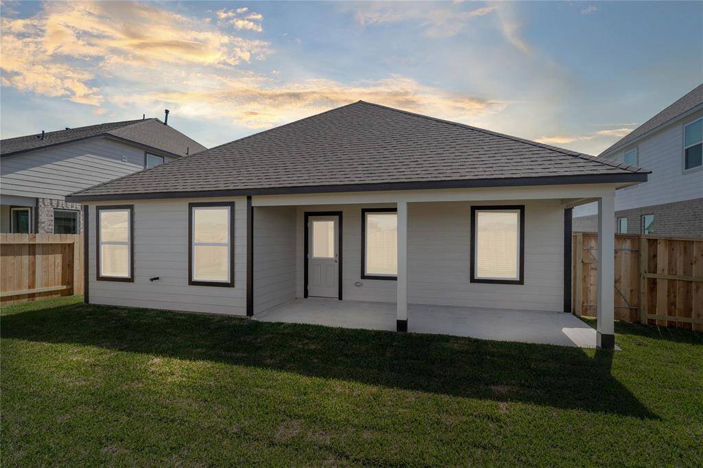 This backyard is enjoyable for everyone! From pets playing, kids jumping on the trampoline, or even having a garden, this amazing backyard provides space for endless activities for the whole family!