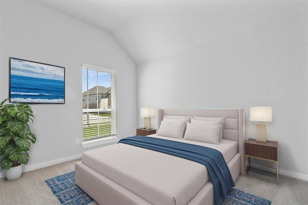 This secondary bedroom features high ceilings, lighting, custom paint, plush carpet, and a large window with privacy blinds!