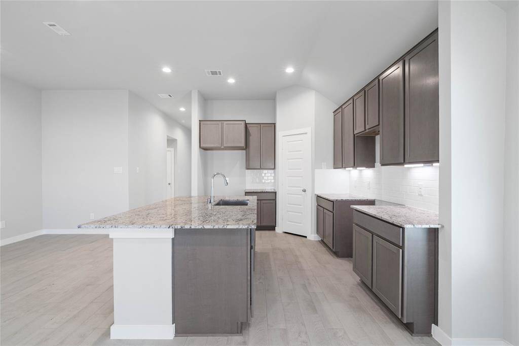 Another view of this spacious kitchen!
