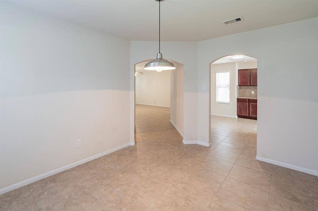 View from Dining Room to Kitchen and Living Space