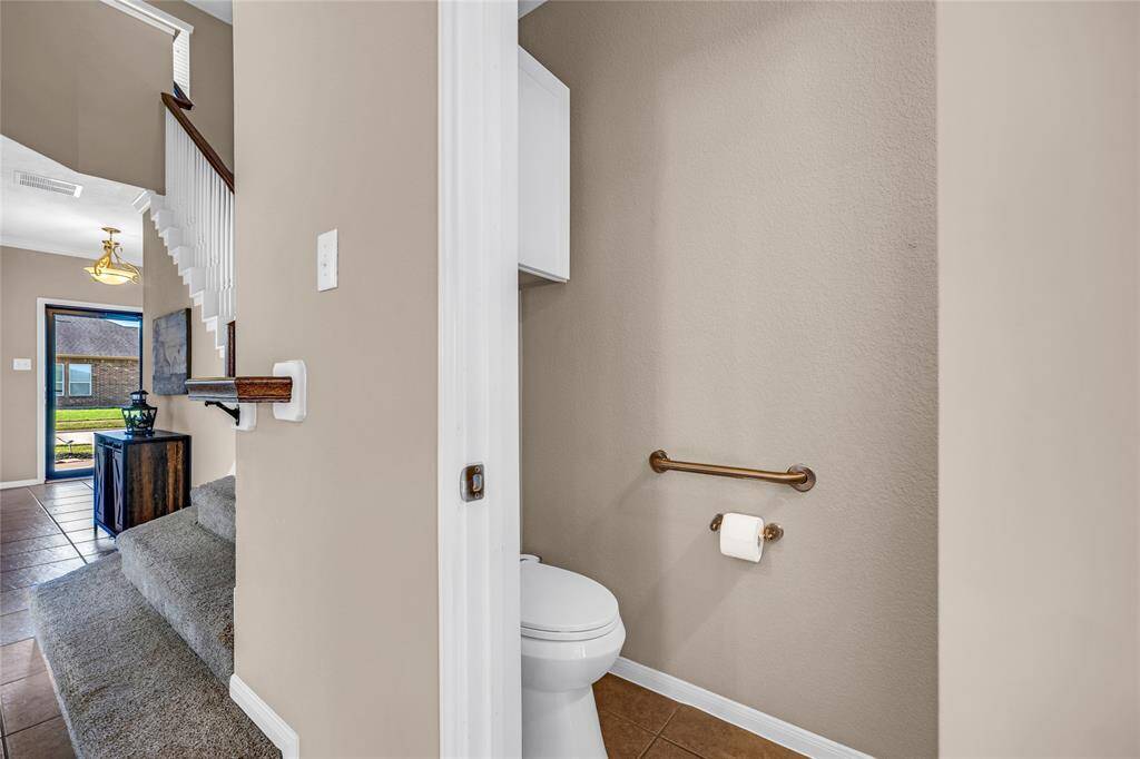 Half-bath with entryway shot.