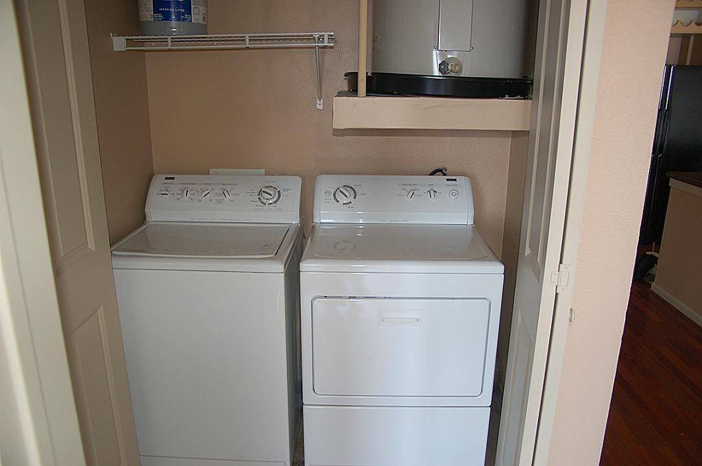 Full sized washer and dryer included.