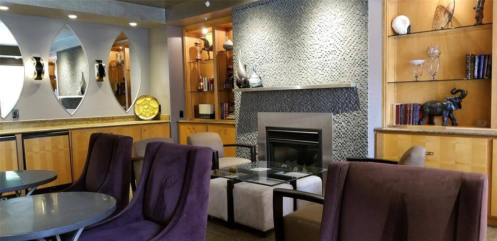 Community clubhouse/library room on ground level. Fireplace and Beverage Chillers available for use.