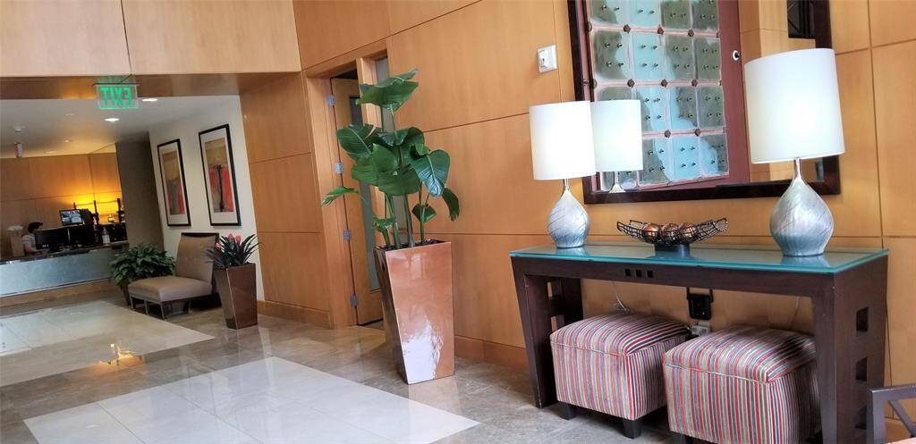 Front reception lobby and 24 hour concierge desk.