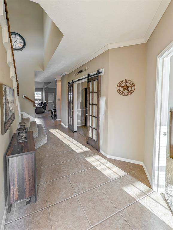 View of barn doors & stairs.