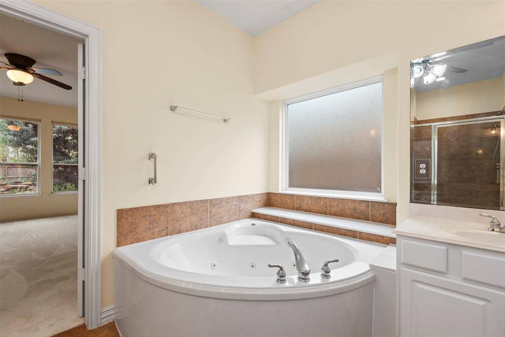 Indulge in relaxation with a luxurious jetted tub, perfect for unwinding.