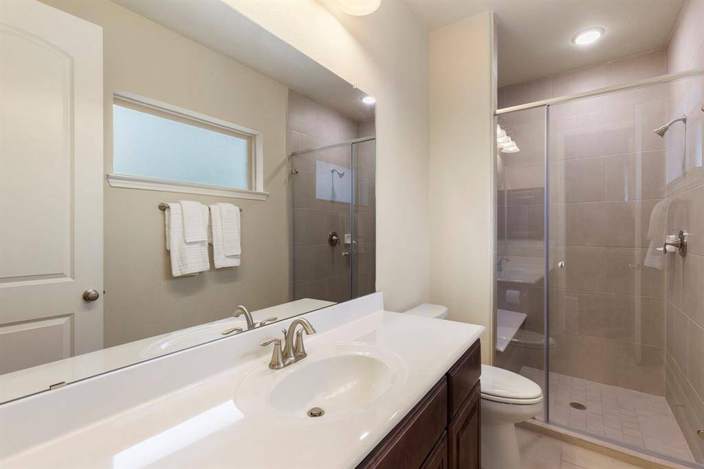 Secondary guest bathroom. Each bedroom has its own bathroom for added privacy!