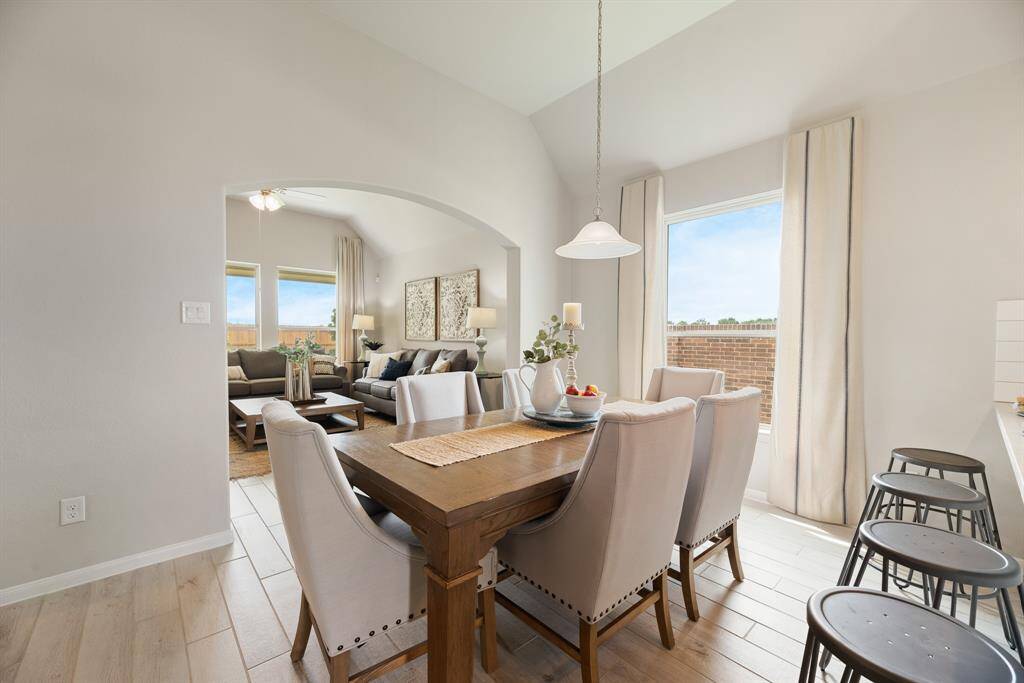 Sun-lit dining area (*Photo not of actual home and used for illustration purposes only.)