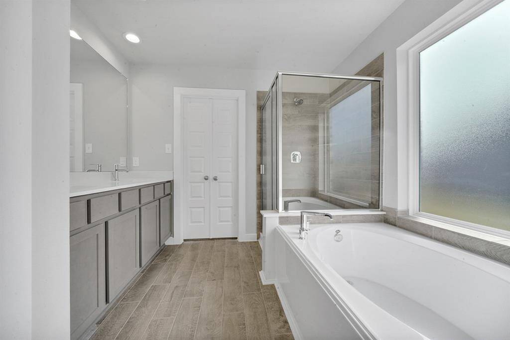 This photo is for illustrative purposes only and is not to be considered an exact replica of the finished home. Rendering does not match the finished product in terms of features, colors, landscaping, etc. Pricing, specifications, square footage and materials are subject to change at any time and without notice.