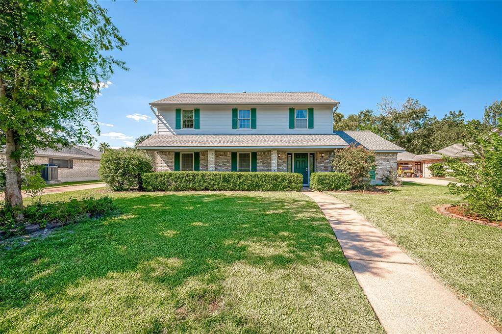 This traditional home features a welcoming front porch and charming window shutters. The roof was replaced in July 2023, offering peace of mind. The front yard, currently landscaped with simplicity, has great potential to become a beautiful, personalized masterpiece. Perfect for those who love to add their own touch!