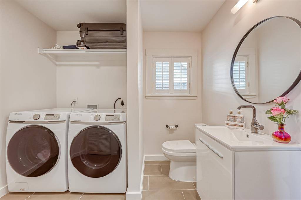 Laundry station located in the powder room.