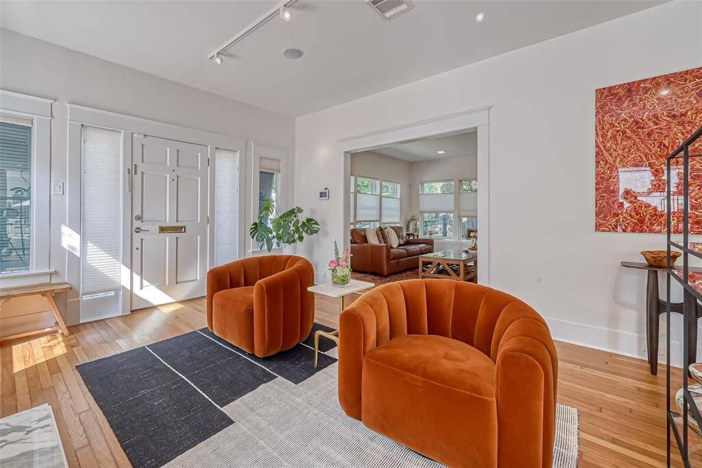 Spacious living room open to dining.