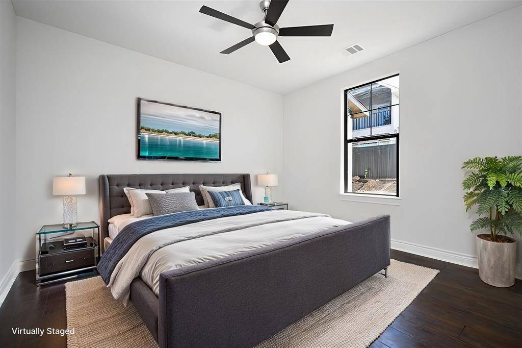 Virtually staged - This is one of the spacious secondary bedrooms downstairs.