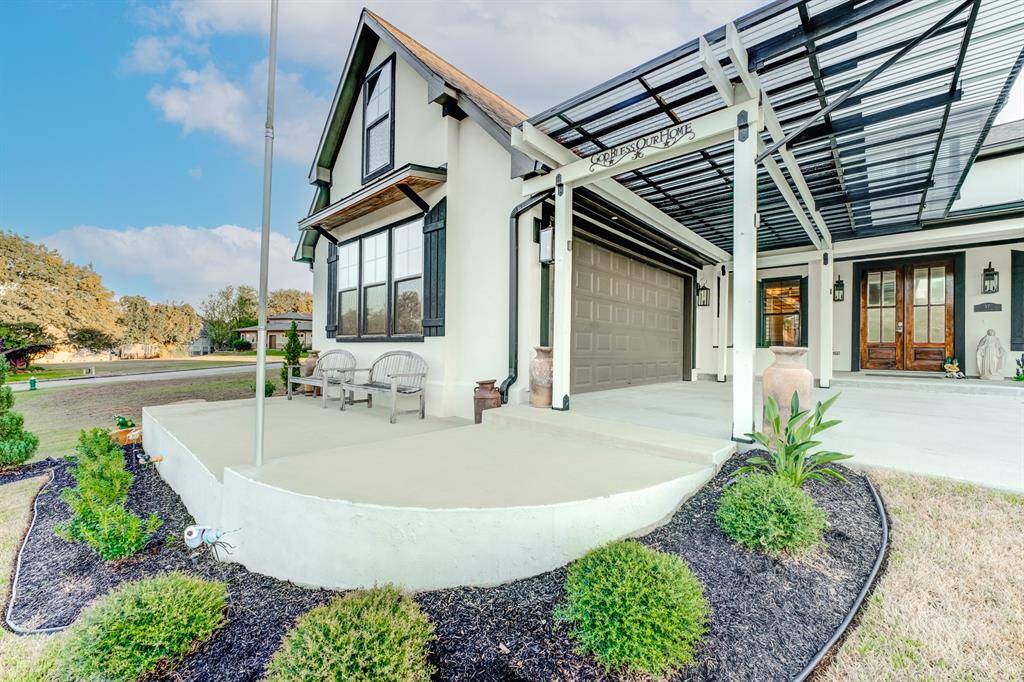 You and your guests arrive to a covered car park and patio entry