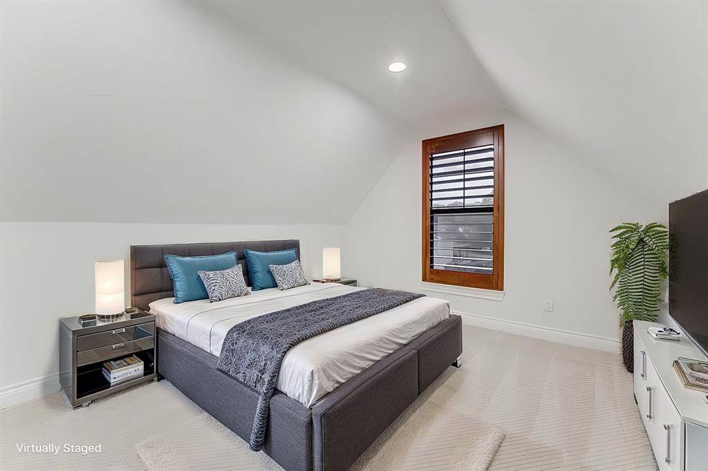 Virtually staged - A fourth bedroom upstairs offers some privacy for guests, a teen space, or an in-law suite.