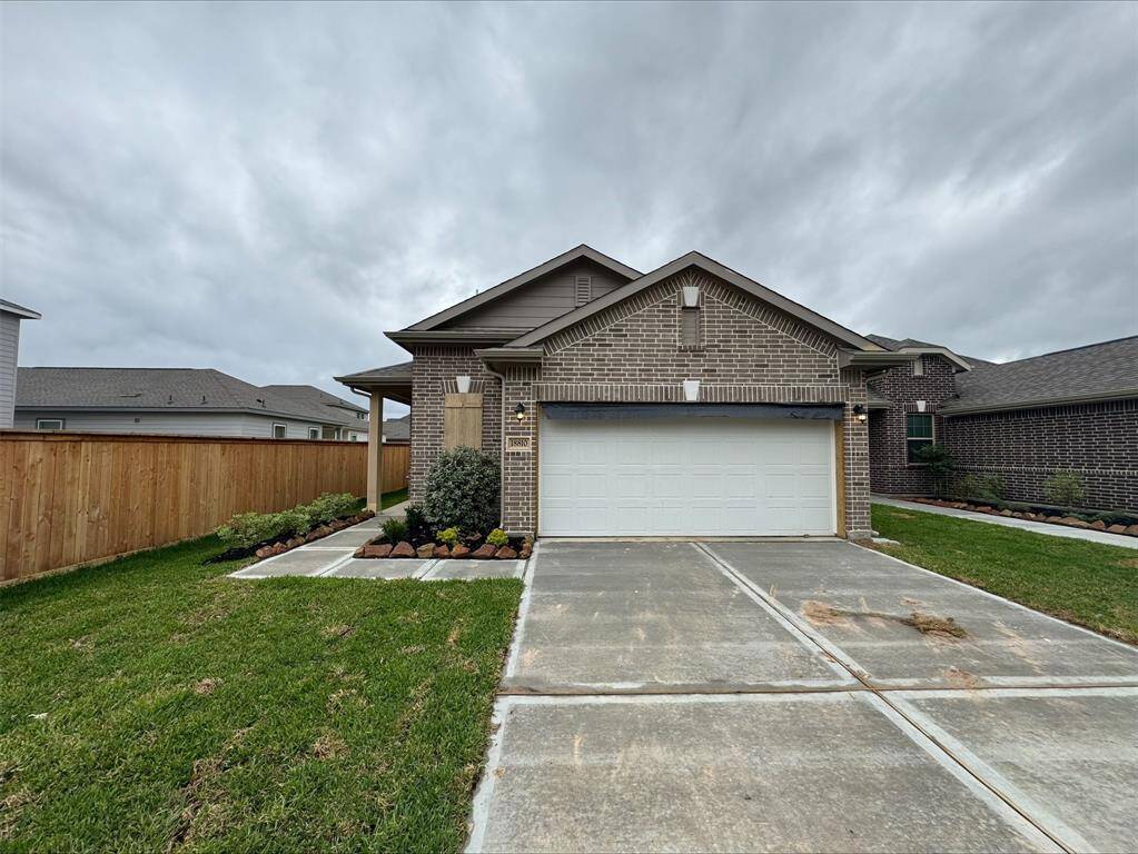 Charming George home design by K. Hovnanian® Homes with elevation B in beautiful The Landing at New Caney.
