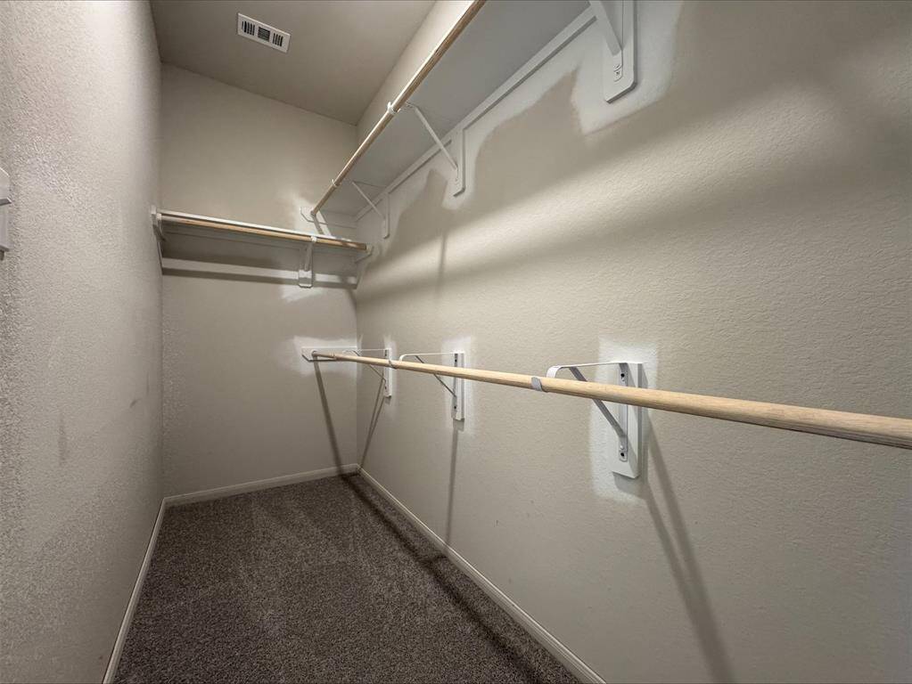 Walk-in closet in owner's suite