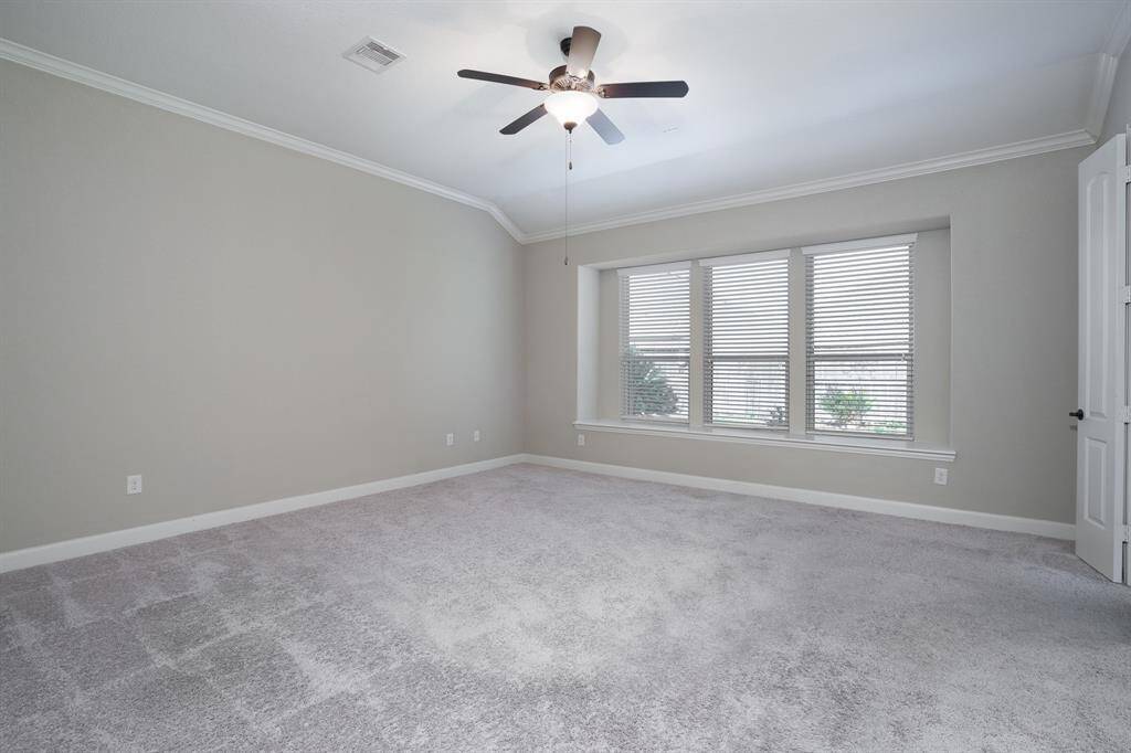 Virtually staged primary bedroom!