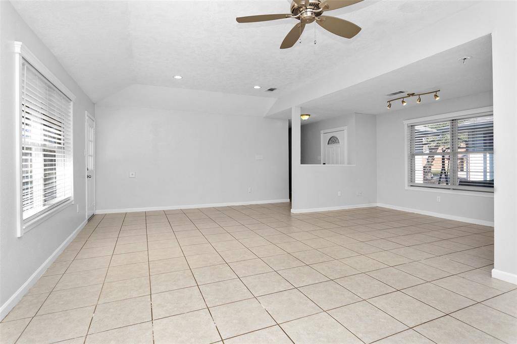 Living room looking onto the entryway.