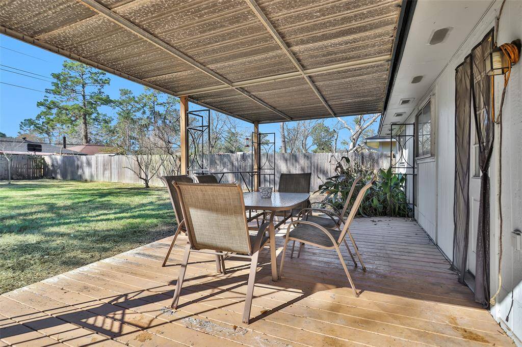 Beautiful large backyard with covered patio.