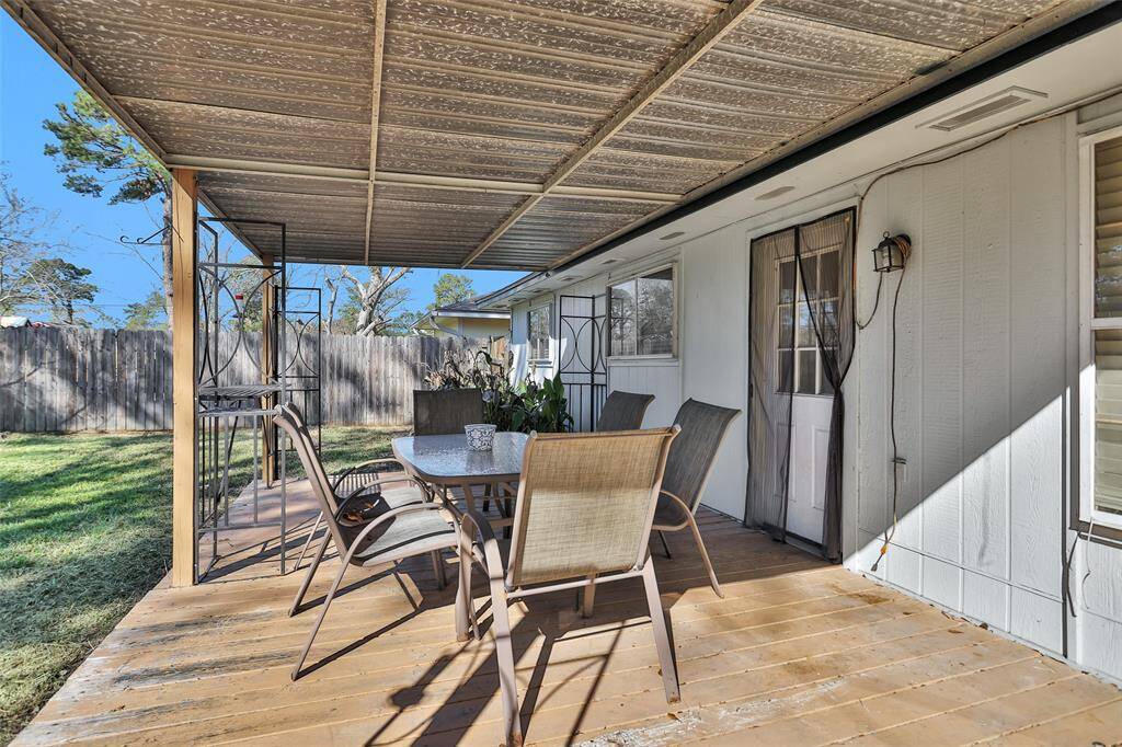 Beautiful large backyard with covered patio.