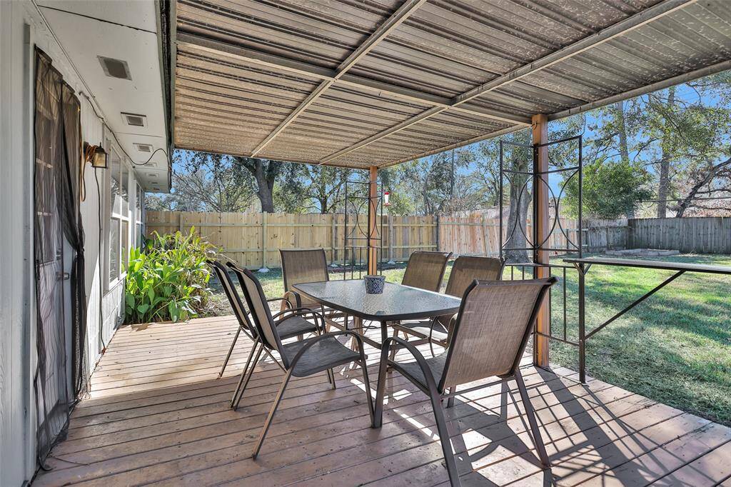 Beautiful large backyard with covered patio.