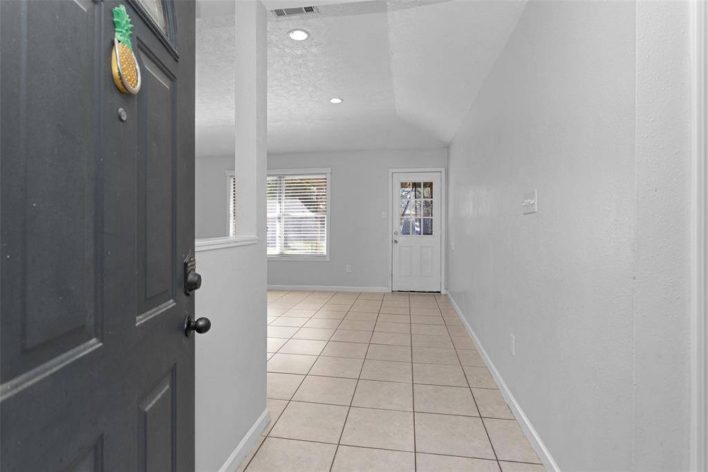 Entryway with pony wall.