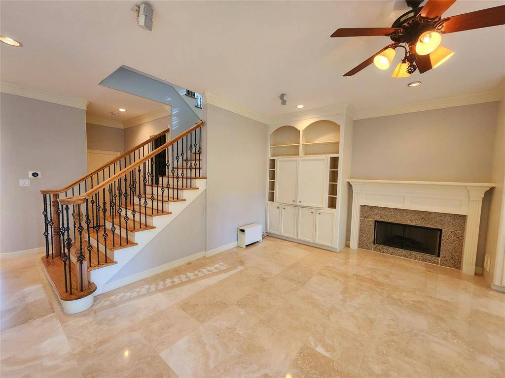Great room with gas log fireplace.