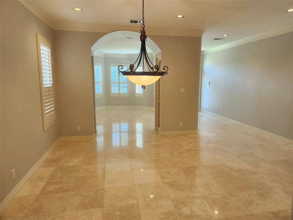 Formal Dining Room and formal living room or office in background.