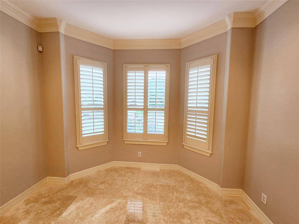 Formal living room or study at front of home. Front door is to the right.