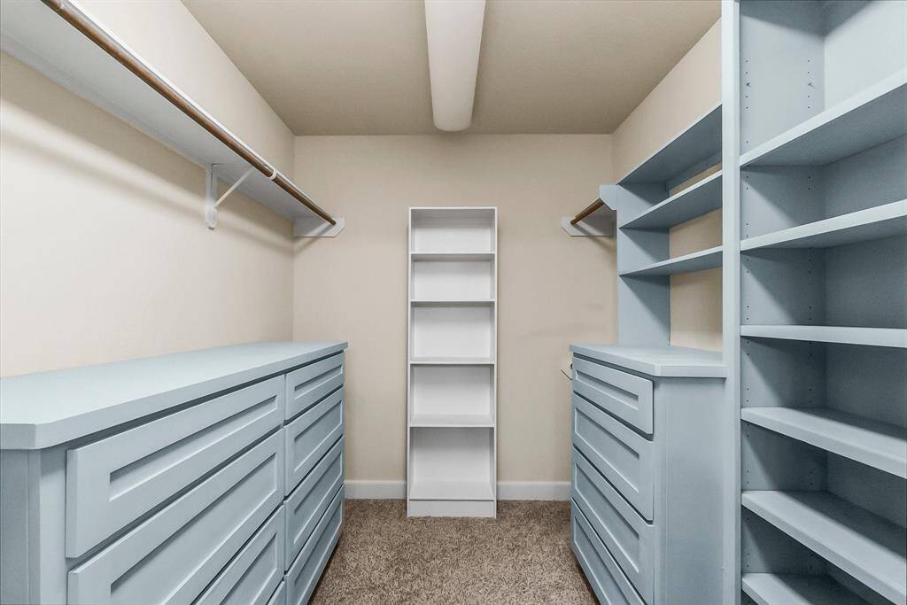 Large custom built walk-in closet