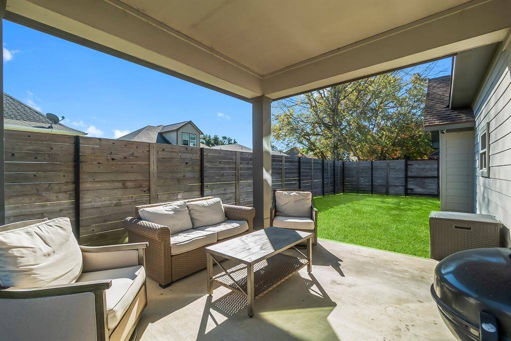 Covered patio with privacy fence