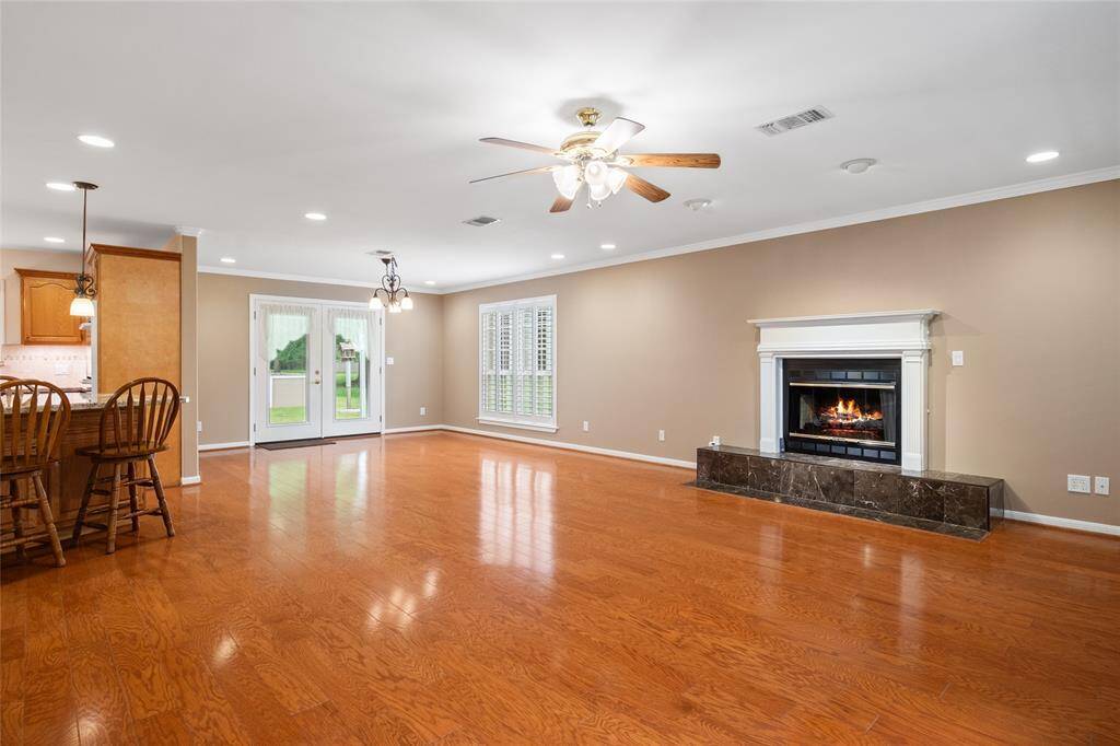 French Doors to the Covered Patio make it easy access for all your entertaining and family gatherings inside and out. Plenty of room for your large dining table and buffet.