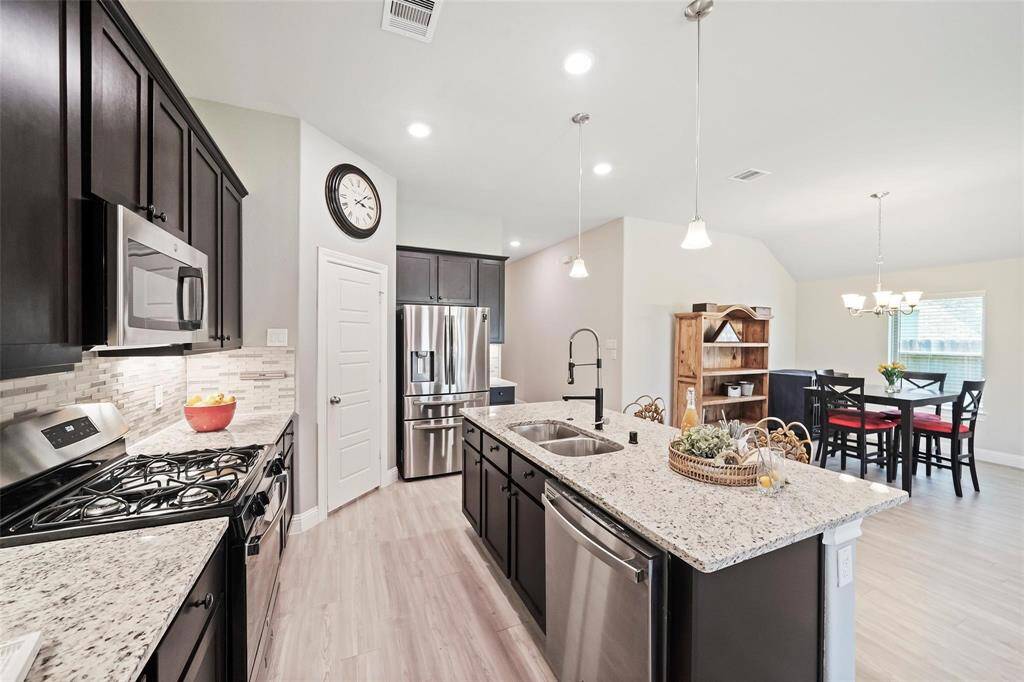 Take a look at the beautiful flooring and view of the dining area as well.