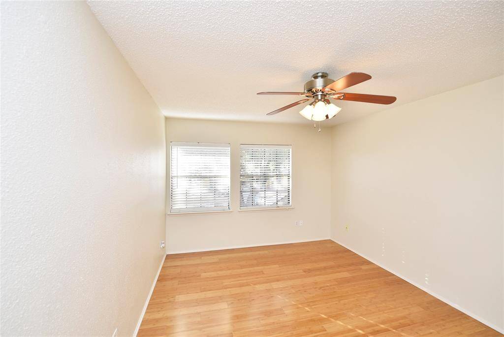 Another view of the upstairs bedroom and two closets.