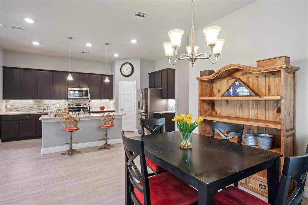 The dining room has plenty of room for any table and even a china cabinet as well.