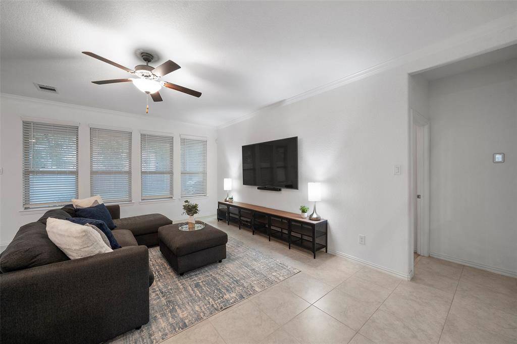 Living room flows seamlessly into Primary Suite!