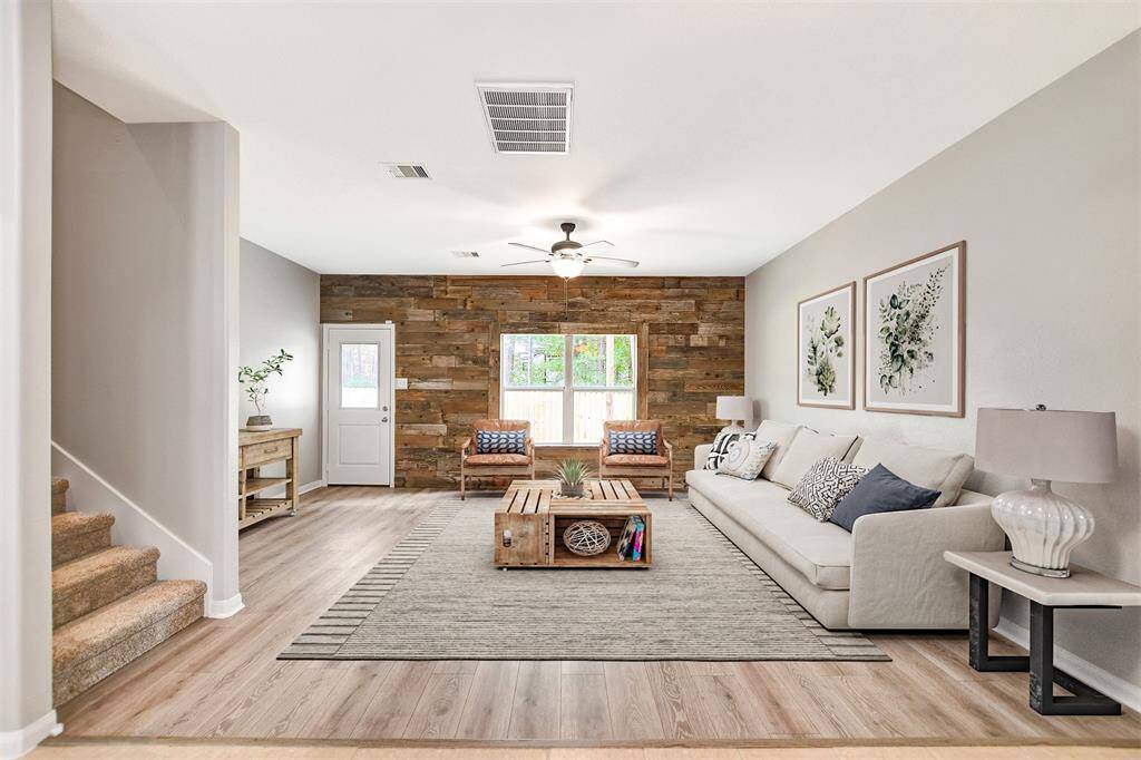 Virtually staged view from dining towards den