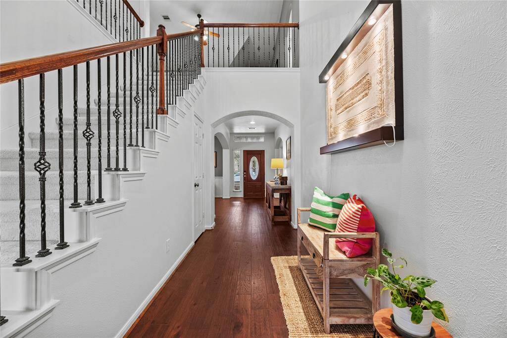 Now into your primary suite. This is a large space to create your own private retreat. The additional sitting area in the primary bedroom is a tranquil retreat and breathtaking views of the backyard.