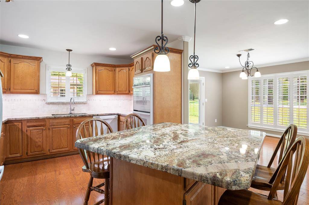 This is the HUB of your home and open to your dining and living, with plenty of room for all the chefs in your family.