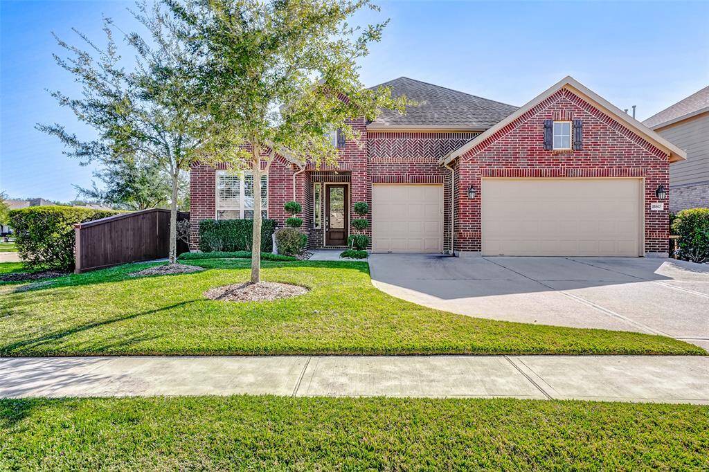 The home features a 3 car garage with a 4 ft extension and epoxy floors.
