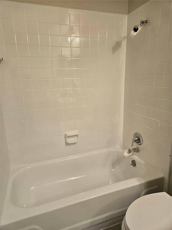 Resurfaced tub and tile! Sparkling white!