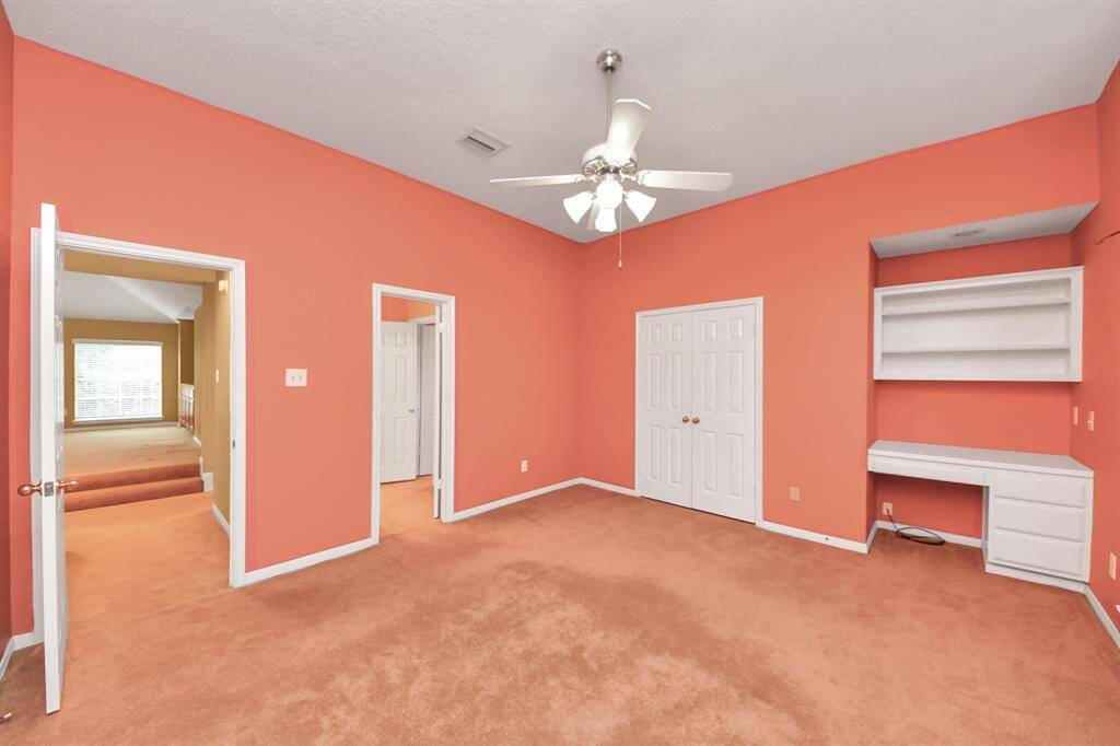 This upstairs bedroom has built-in storage