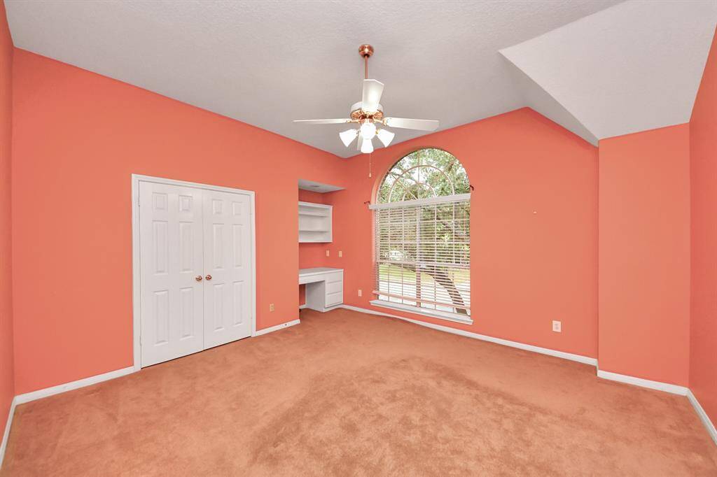 Another look at this upstairs bedroom - you can see Cinco Lake and the walking path from this window.