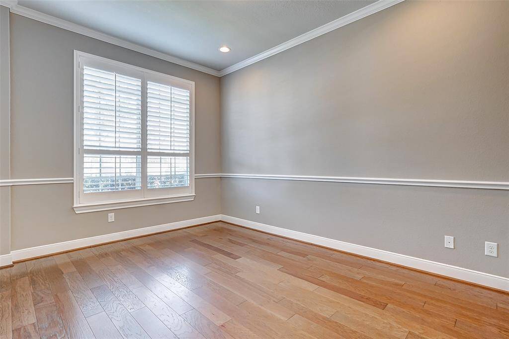 As you enter the home there is a flex room that can be used as a game room or formal dining space.