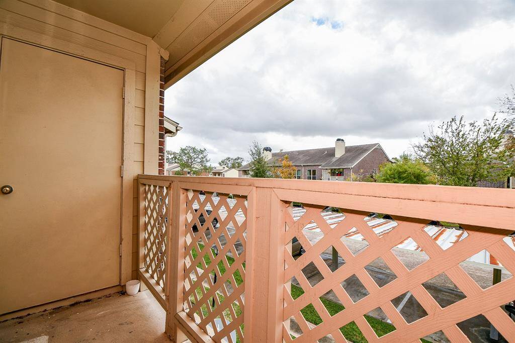 Balcony opens to living room and completed with an outdoor storage area!