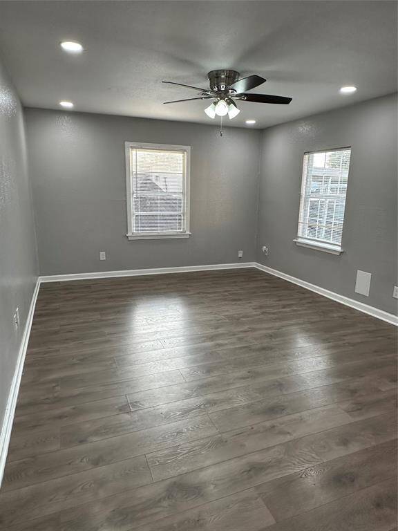 Lving Room with lots of windows for plenety of sun light