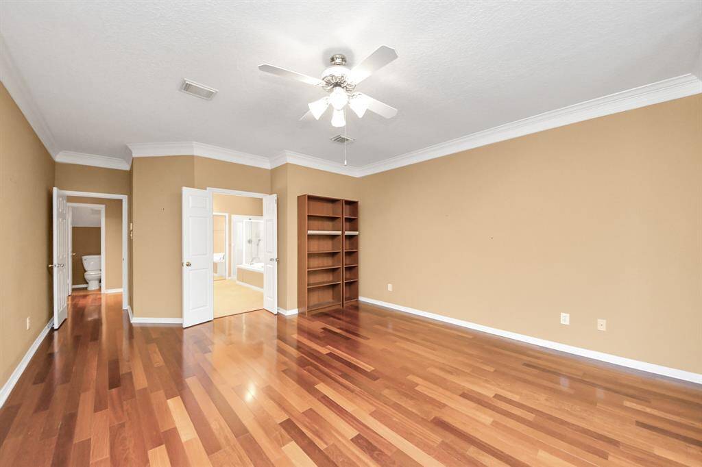 One more look at the Primary showing off those beautiful wood floors.