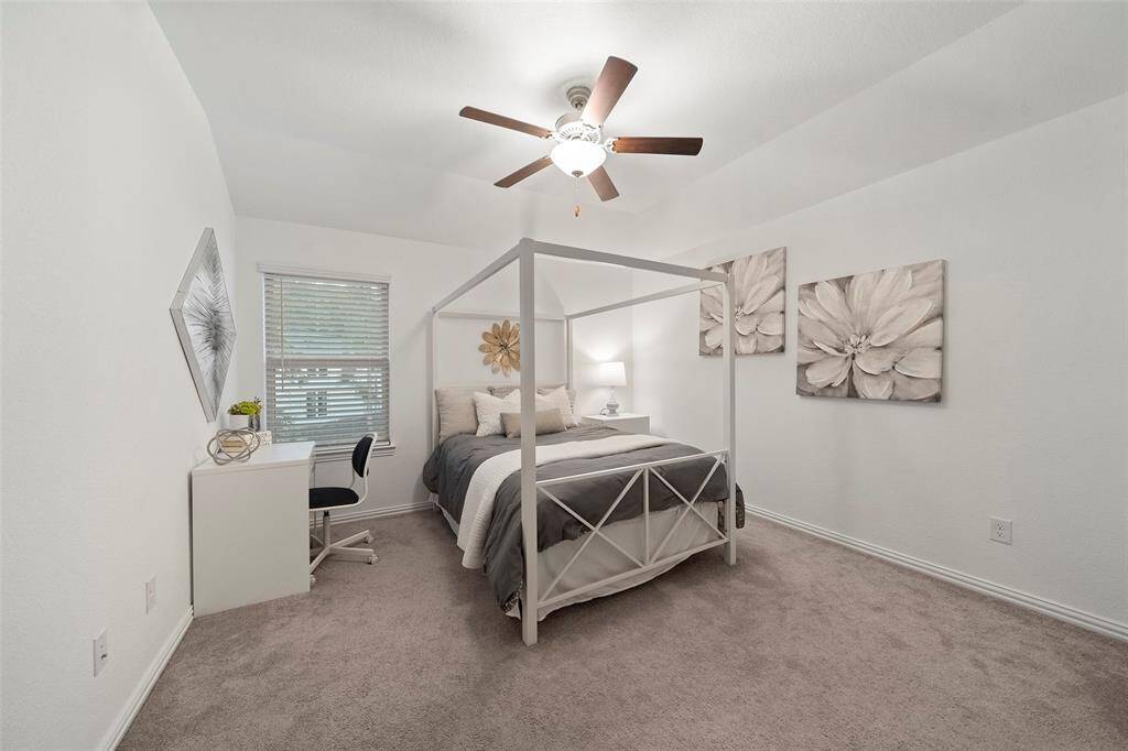 Another spacious secondary bedroom, the perfect retreat with all neutral decor!